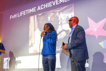 FvH Awards 2026 host Chloe Morgan congratulates Lifetime Achievement Awards winners Joanie Evans and Aslie Pitter
